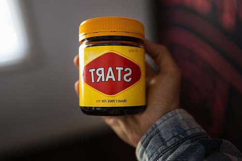 person person holding jar food