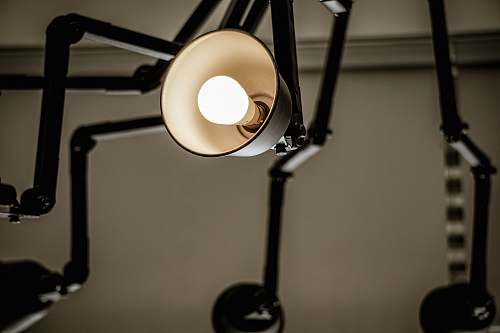 lamp turned-on white light with shade lampshade
