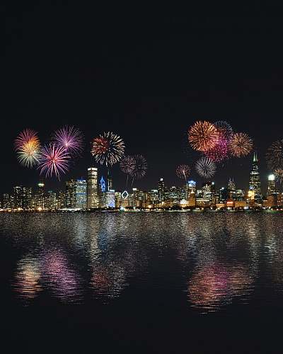 outdoors skyline buildings under fireworks display night