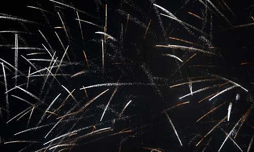 outdoors fireworks display during nighttime black-and-white