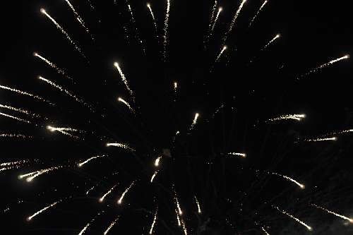 outdoors yellow fireworks during nighttime nature