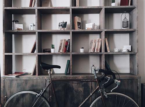bike bicycle leaning on shelf bicycle