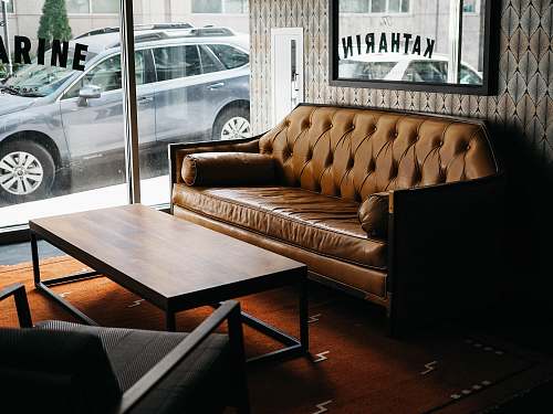 furniture gray SUV parked outside building couch